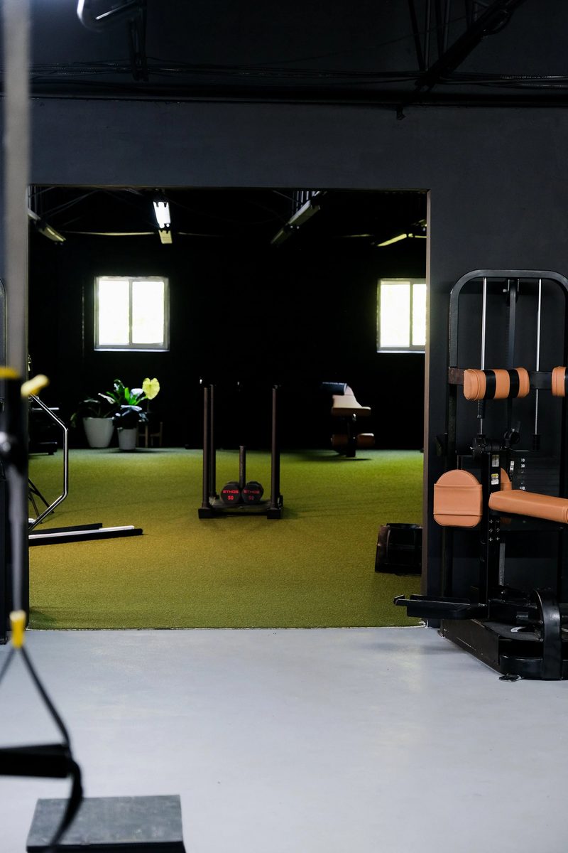 A wide view down the studio floor toward the windows
